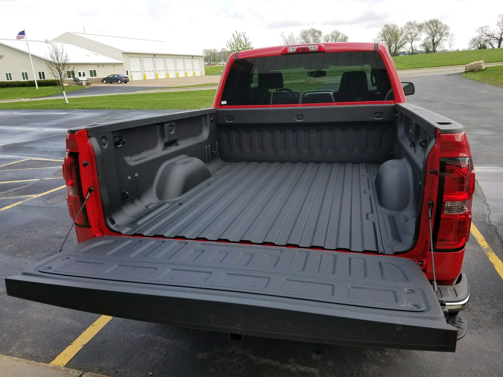 Fleet work truck with sprayed underbody rust protection